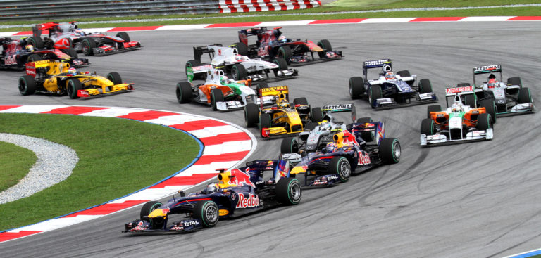 Link to: https://commons.wikimedia.org/wiki/File:2010_Malaysian_GP_opening_lap.jpg