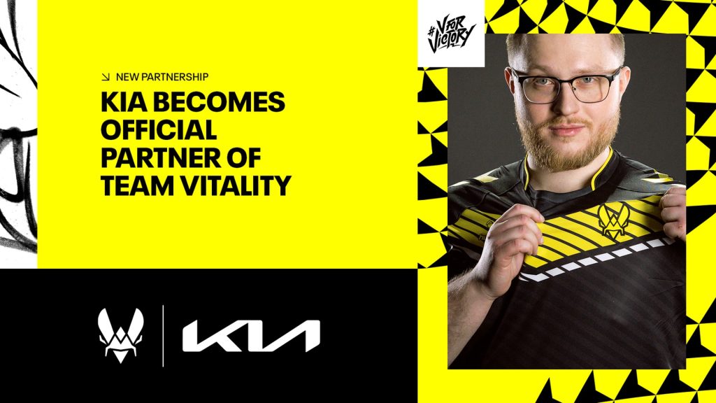 Screenshot of Team Vitality and KIA logo on black background surrounded by yellow and black text