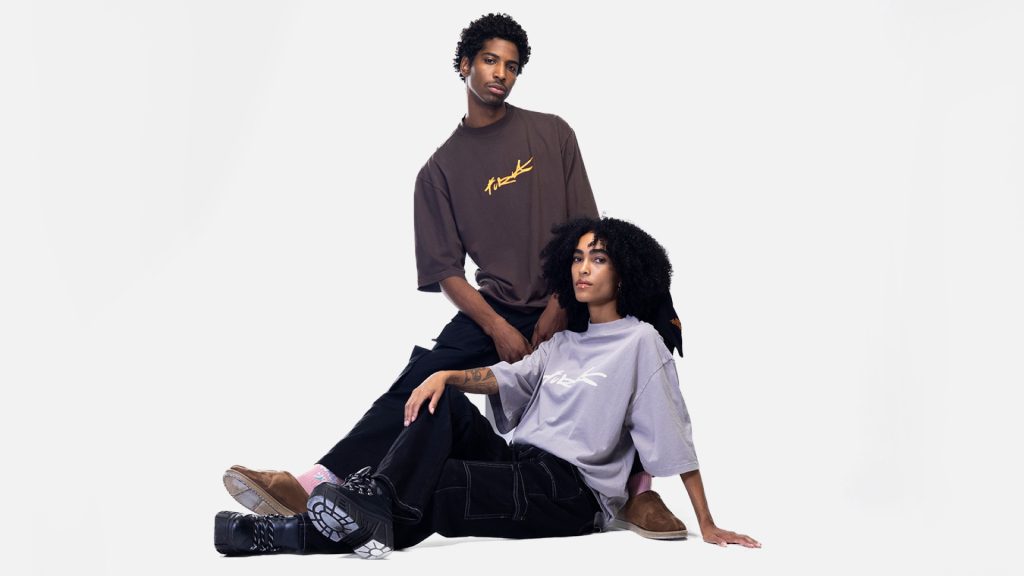 Image of models wearing FURIA clothing on a white background