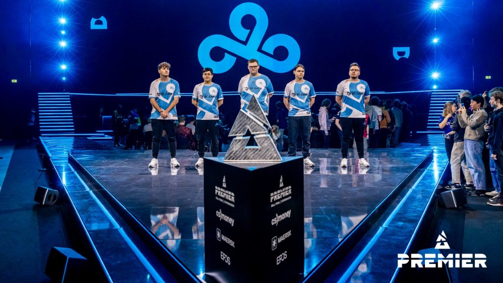 Image of Cloud9 counter strike team standing on stage with BLAST Premier trophy in foreground