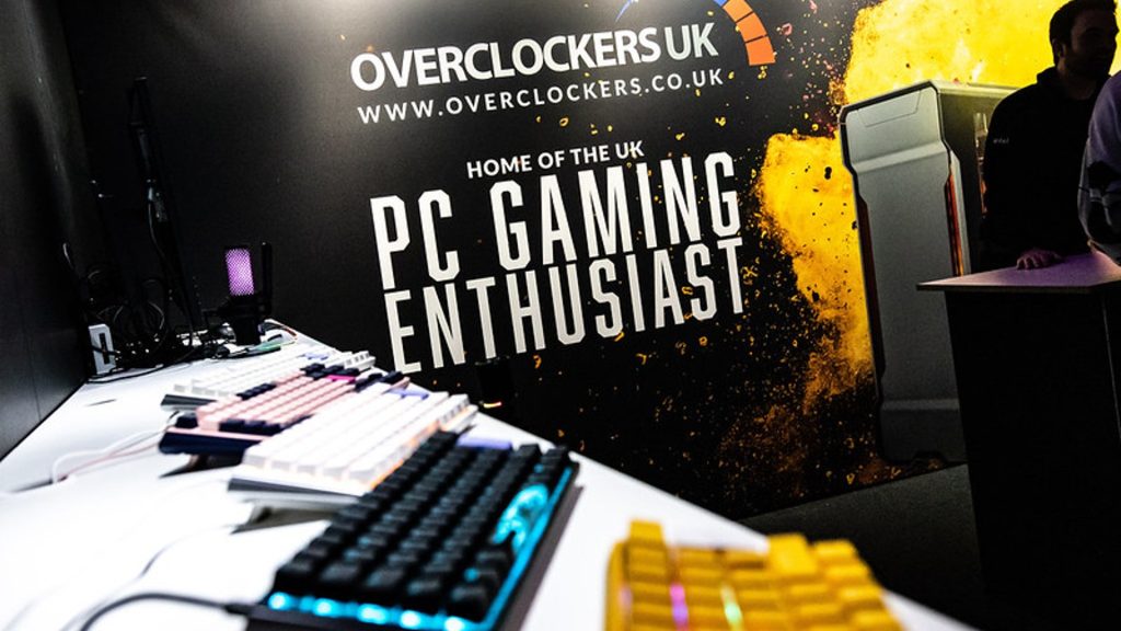 Image of keyboard on table at EPIC.LAN with Overclockers UK logo in background