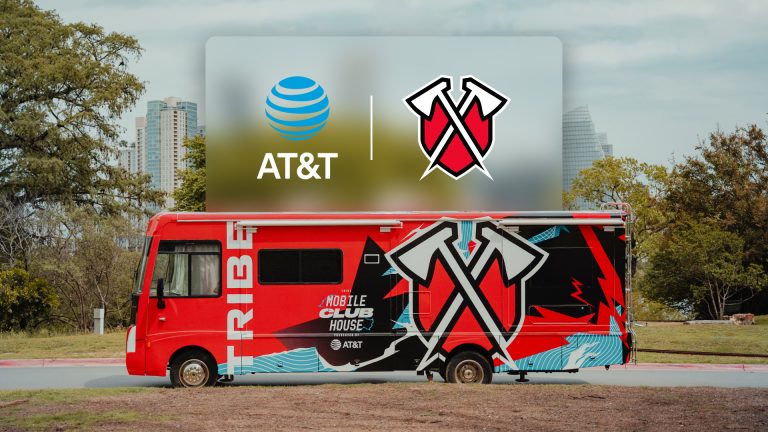 Tribe Gaming and AT&T mobile club house RV with Tribe Gaming and AT&T logos in foreground