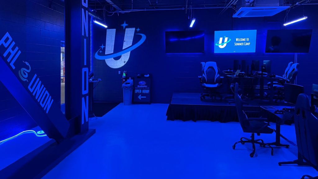 Image of Uplink esports facility with logo in background